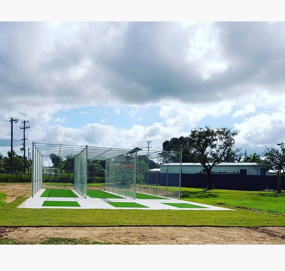 A Cricket Net is Sitting in the Middle of a Grassy Field — Turf Central In Chelona, QLD