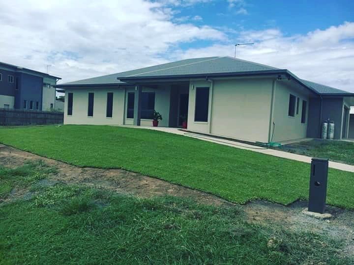 A House With a Lush Green Lawn in Front of It — Turf Central In Chelona, QLD