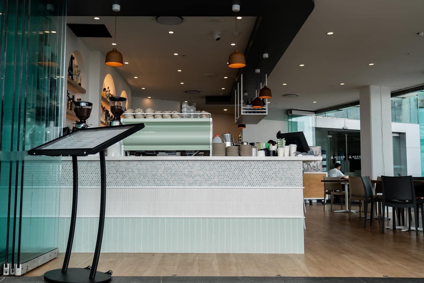 The Inside of a Restaurant With a Counter and Tables — JIC Projects Pty Ltd in Runaway Bay, QLD
