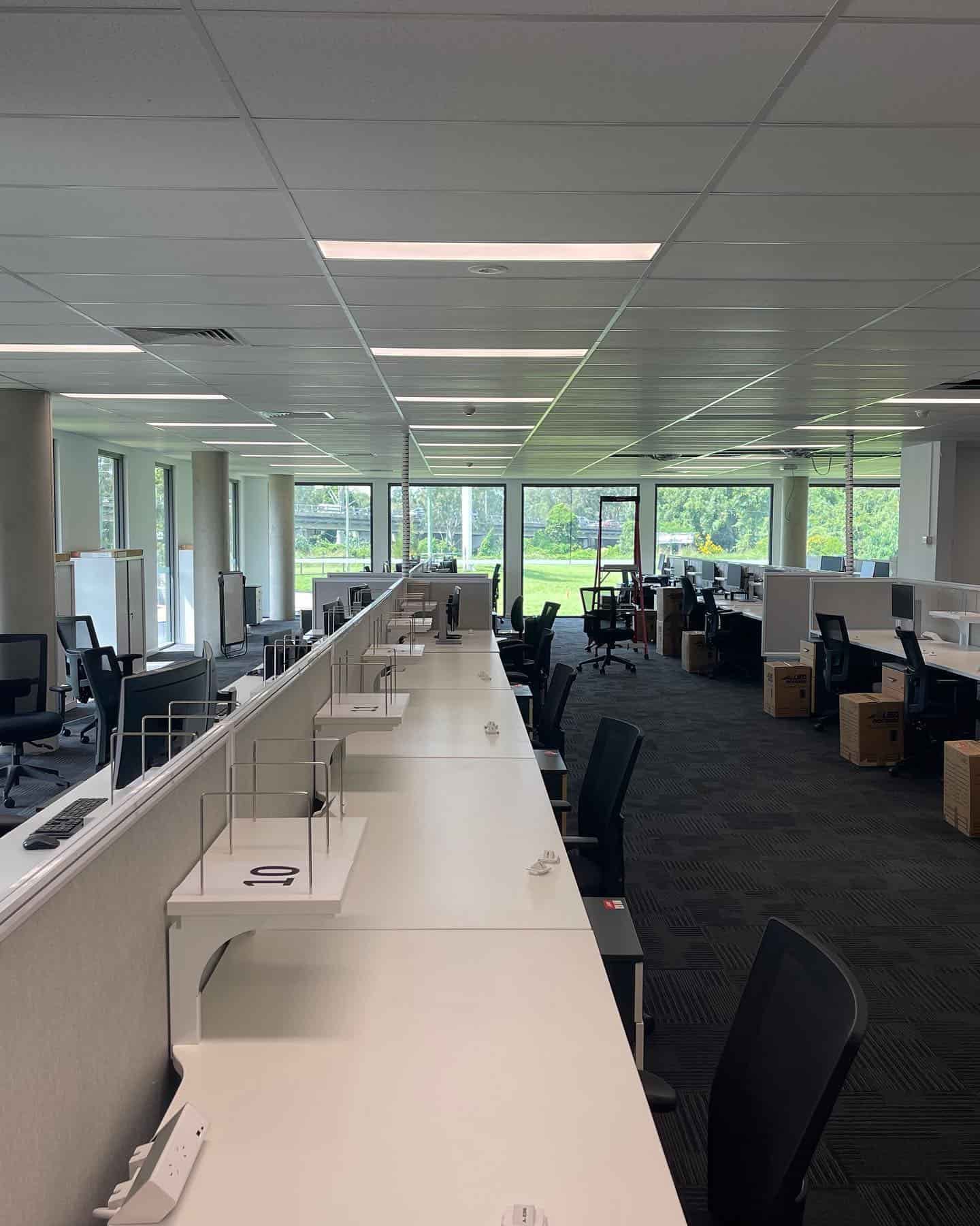A Large Office With a Lot of Desks and Chairs — JIC Projects Pty Ltd in Runaway Bay, QLD