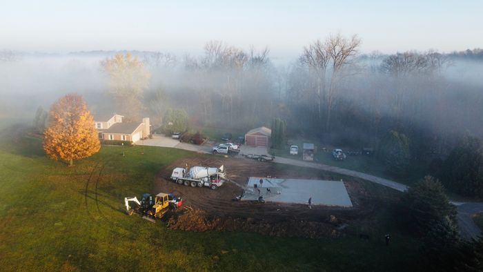 Construction Equipment Excavator At Building Site — Kendallville, IN — Legendary Concrete & Excavation