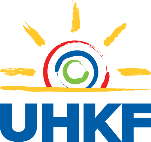 Logo of the UHKF: a sun design with colorful concentric circles, yellow rays, and blue text