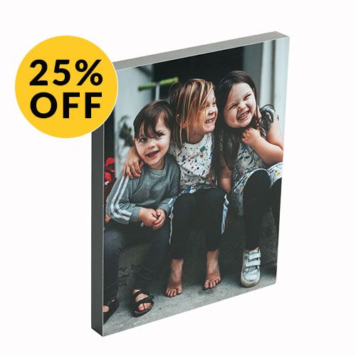 Studio print of three little kids on a step