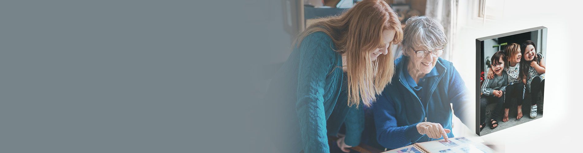Mom and daughter looking at old photos