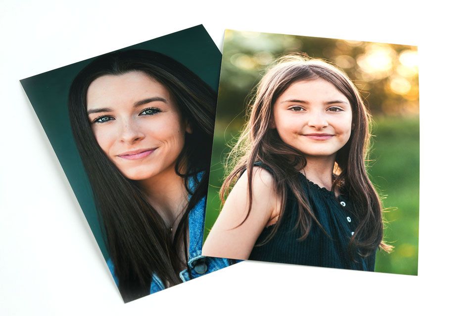 Two young women on photo paper samples