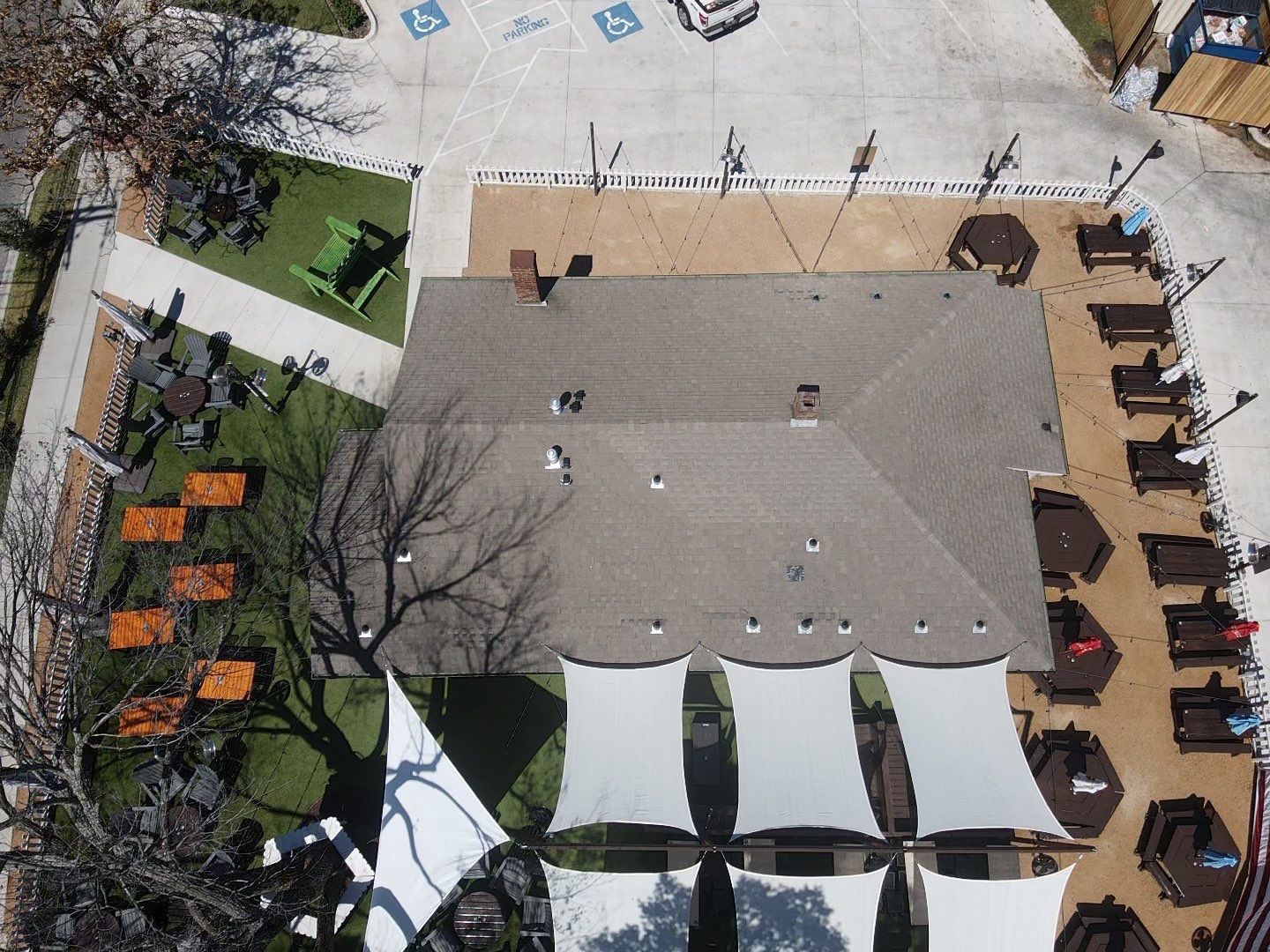 An aerial view of a restaurant with tables and chairs