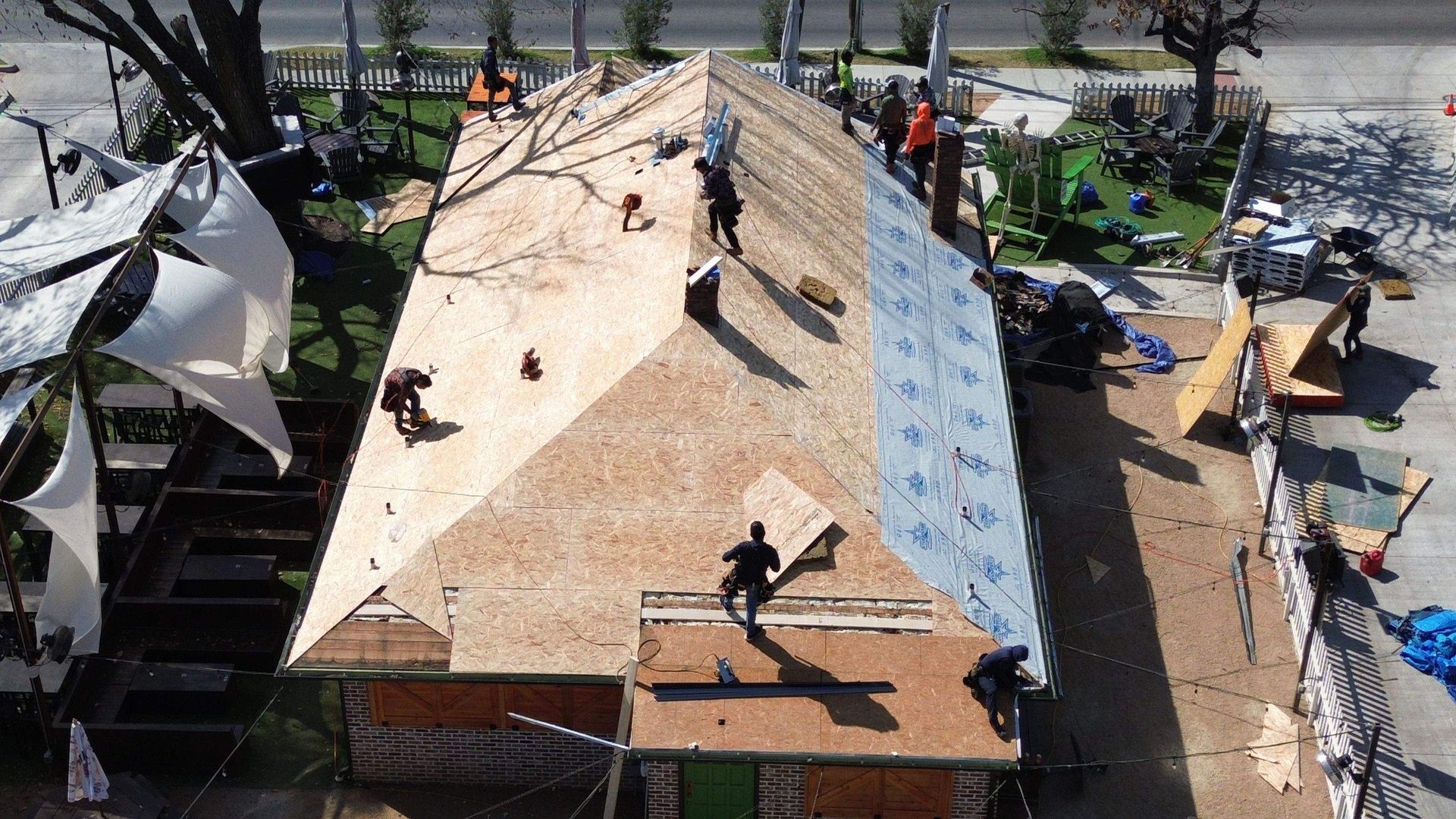 An aerial view of a roof that is being built