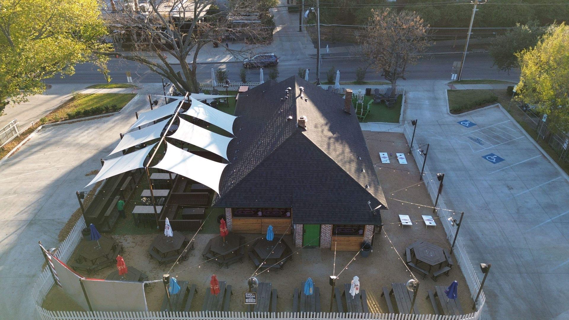 An aerial view of a restaurant with tables and chairs