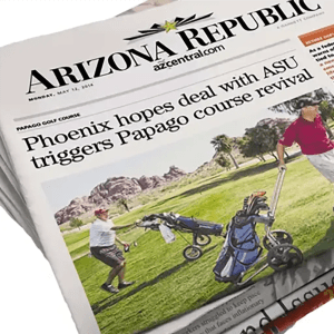 A stack of arizona republic newspapers on a white background