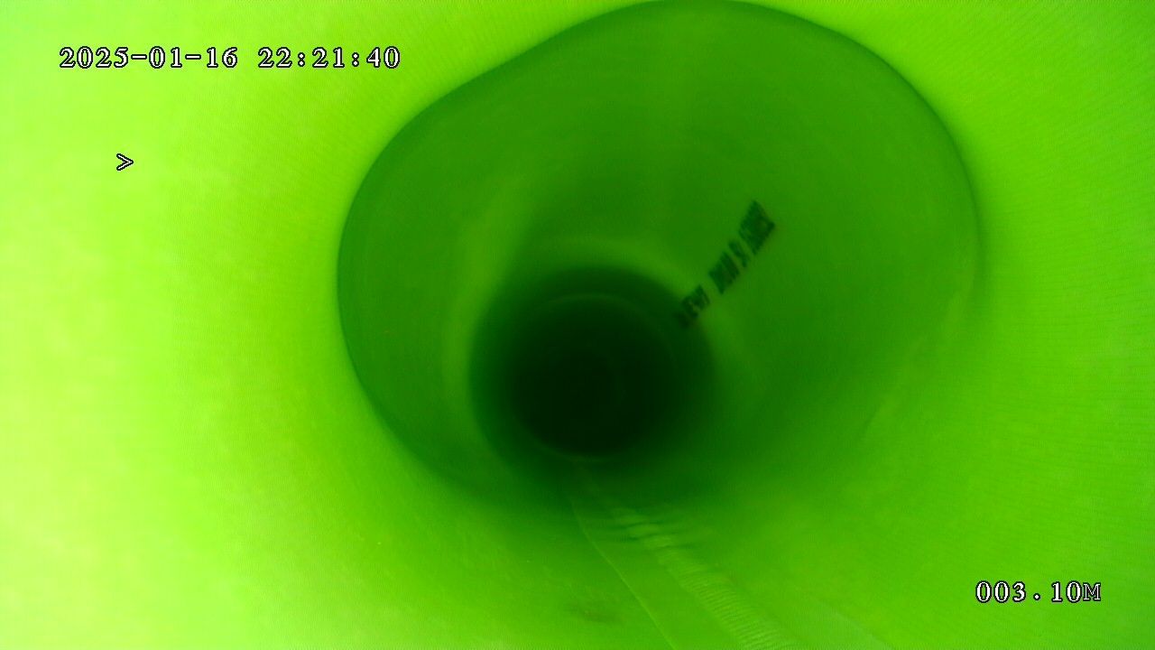 A picture of a green pipe taken on january 15th
