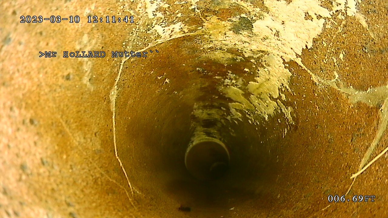 A close-up of a drain before pipe relining by Steyn's Plumbing in Lynnwood, Pretoria.