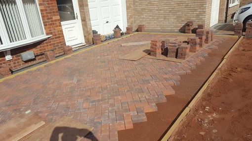 Block paved drive under construction