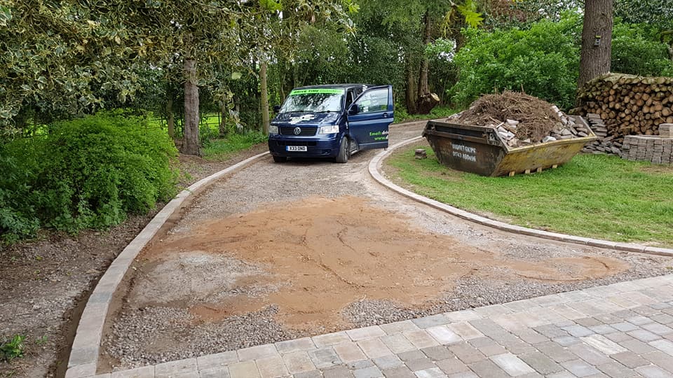 Newly laid golden flint gravel driveway in rural shropshire