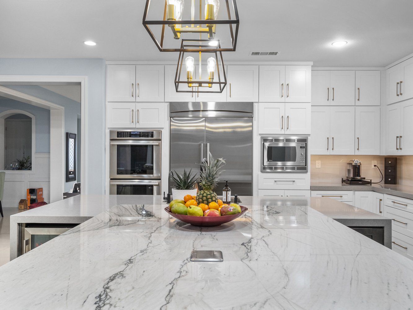 Modern style light fixtures in transitional kitchen remodel in Aliso Viejo, CA