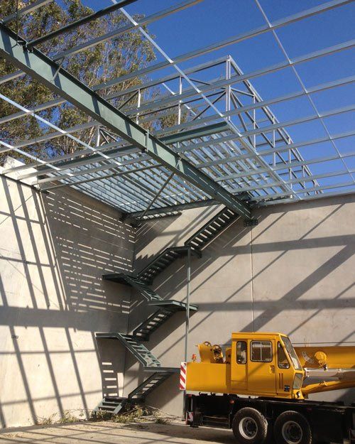 steel staircase leading to roof truss