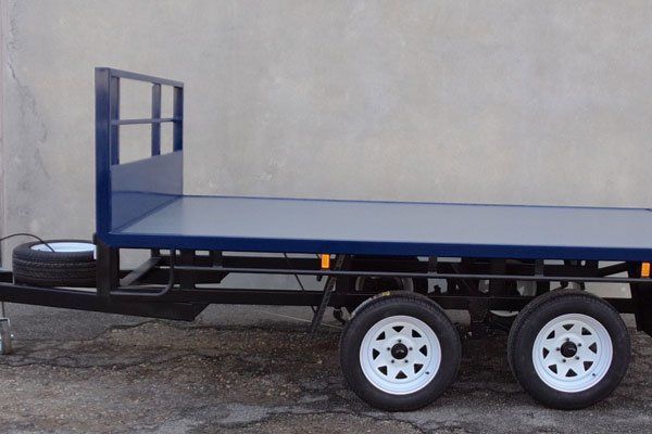 blue flat bed trailer