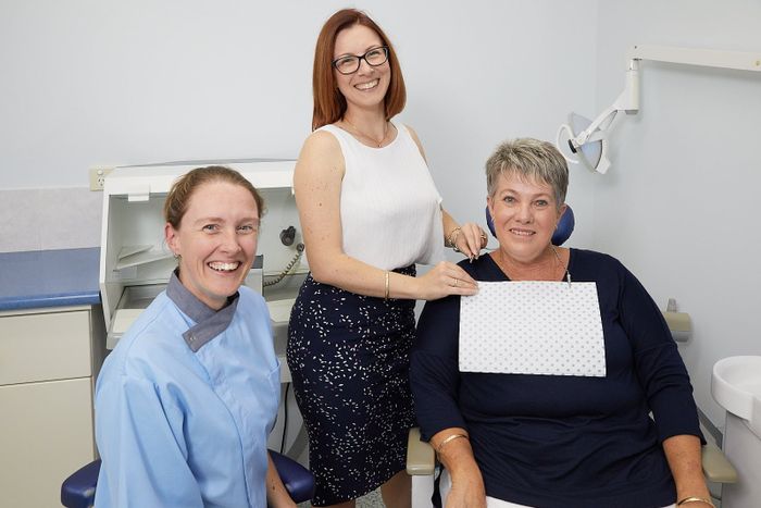 Denture Clinic Staff with Client — Bromley's Denture Clinic in Tweed Heads South, NSW