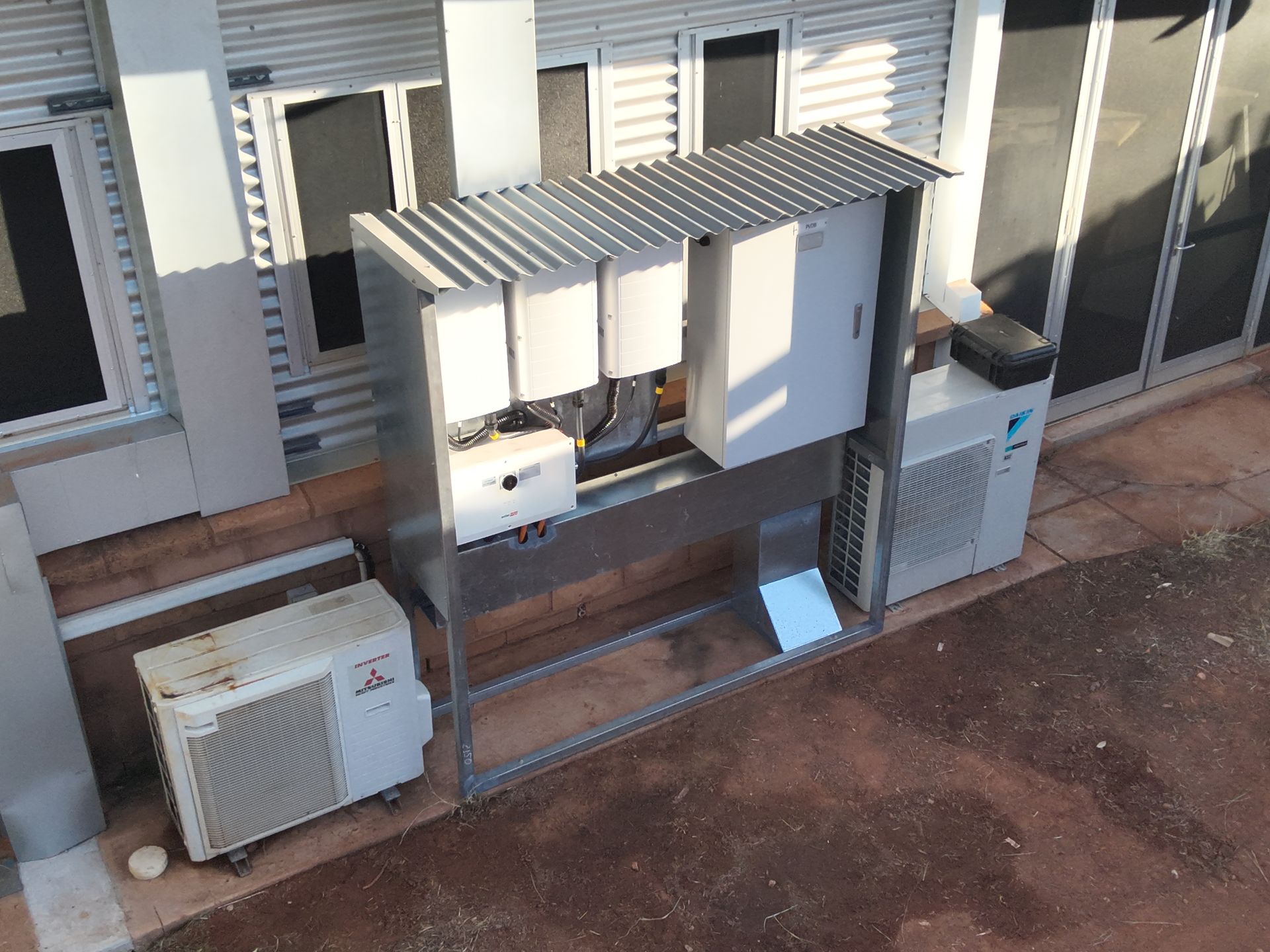 Air Conditioner Units Outside A House — Inland Electrical in Humpty Doo, NT