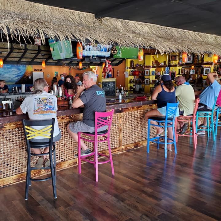 people sitting at the bar