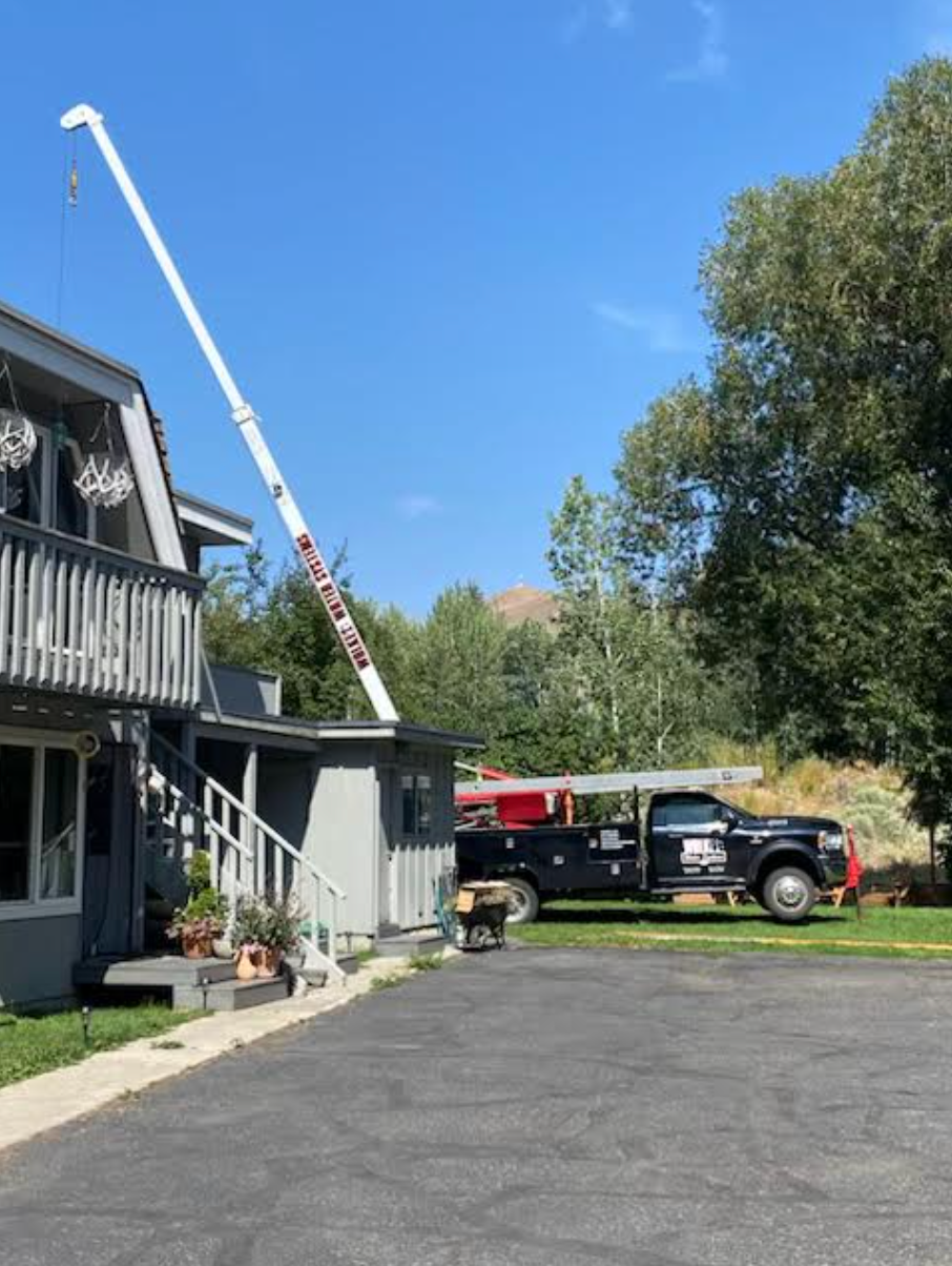 A septic tank is sitting in the middle of a dirt field.