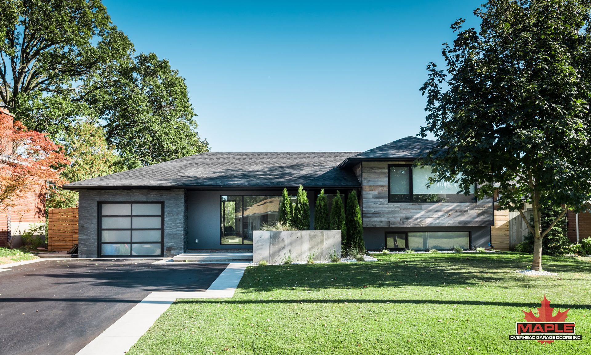 A house with a maple logo on the front of it