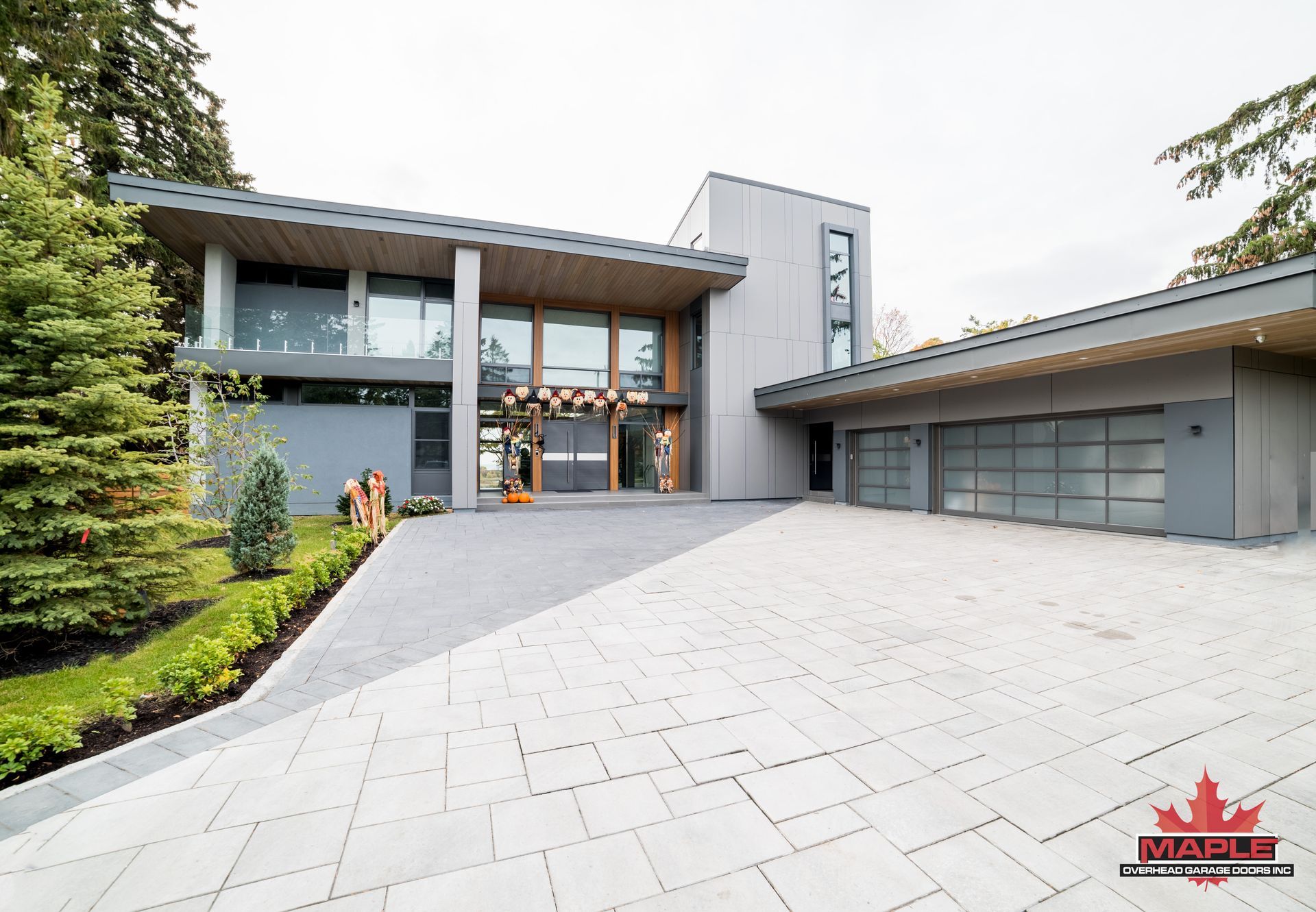 A large house with a maple logo on the side