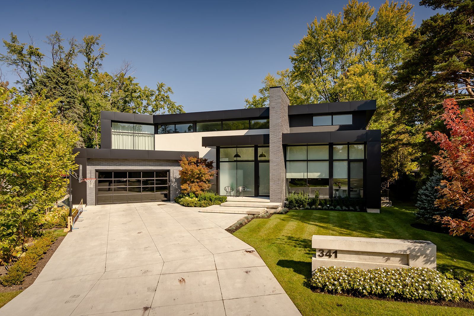 A modern house with a driveway leading to it
