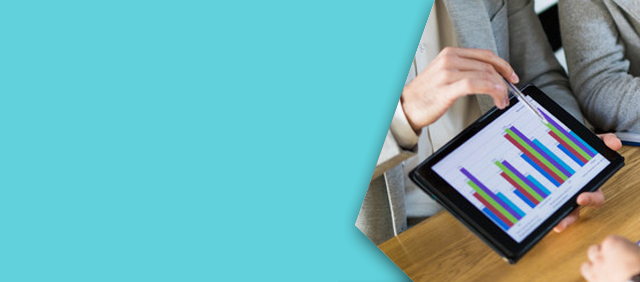 Business people discussing market research statistics during business meeting.