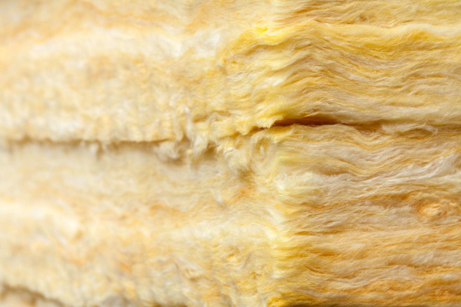 A close up of a piece of wool insulation.
