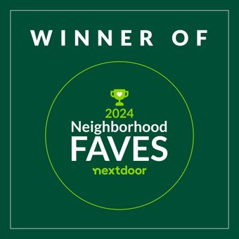 A green circle with the words `` winner of neighborhood faves nextdoor '' on it.
