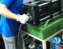 Prensagem de Mangueiras Hidráulicas - ST Flex Borrachas e Metais