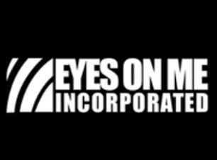 Logo for Eyes on Me Incorporated, white text on black background. Features a stylized eye design.