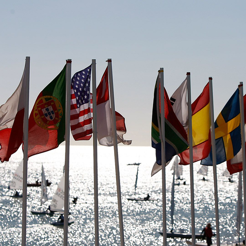 A row of flags with one that has the letter t on it