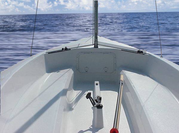 A boat is floating on top of a large body of water