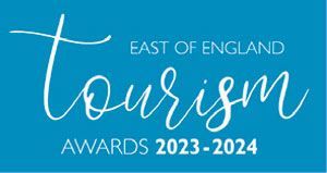 Logo for East of England Tourism Awards 2023-2024. Features a blue background and white cursive text.