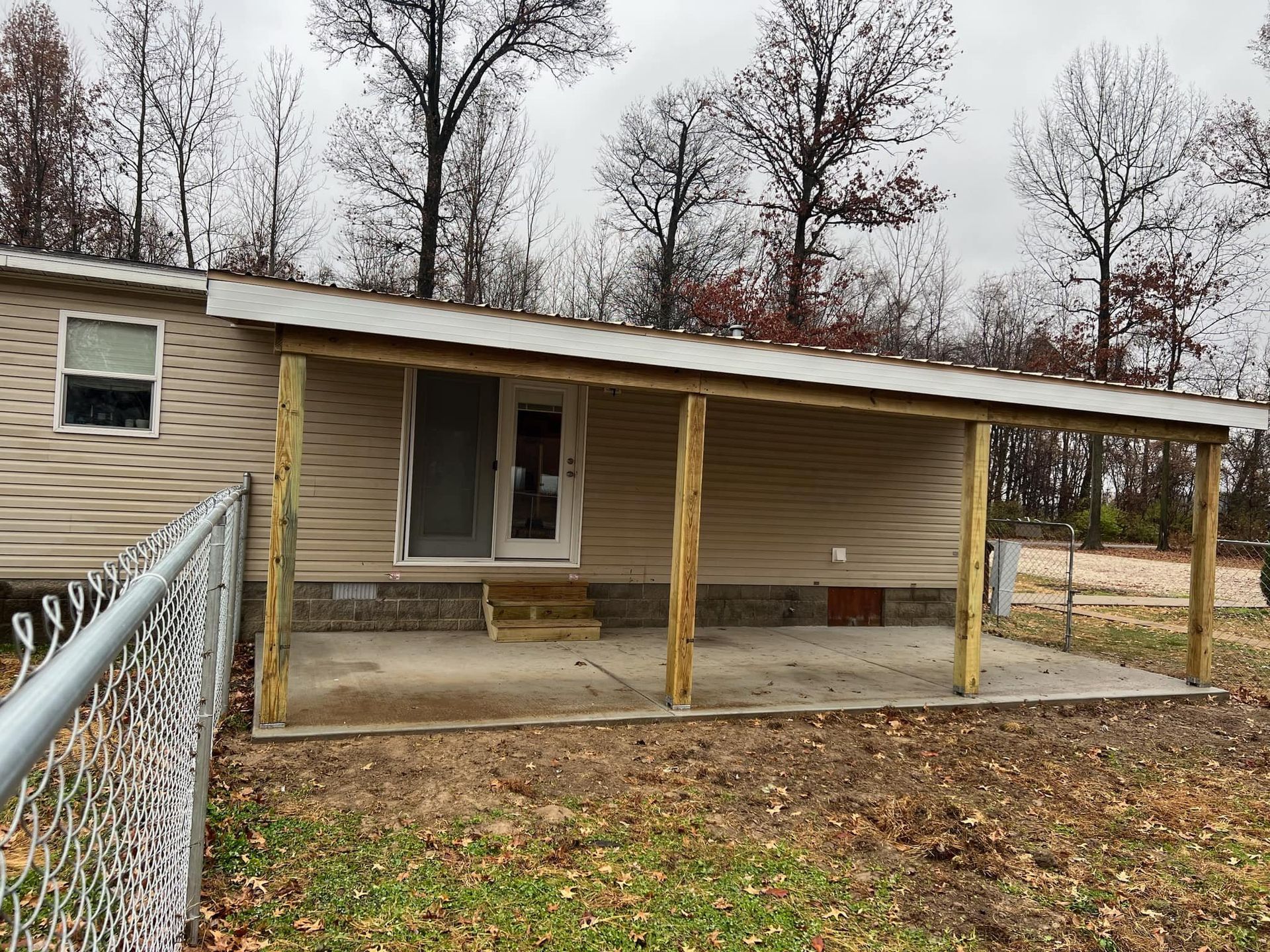 A House With A Porch And A Chain Link - Princeton, IN - J. Koberstein Construction