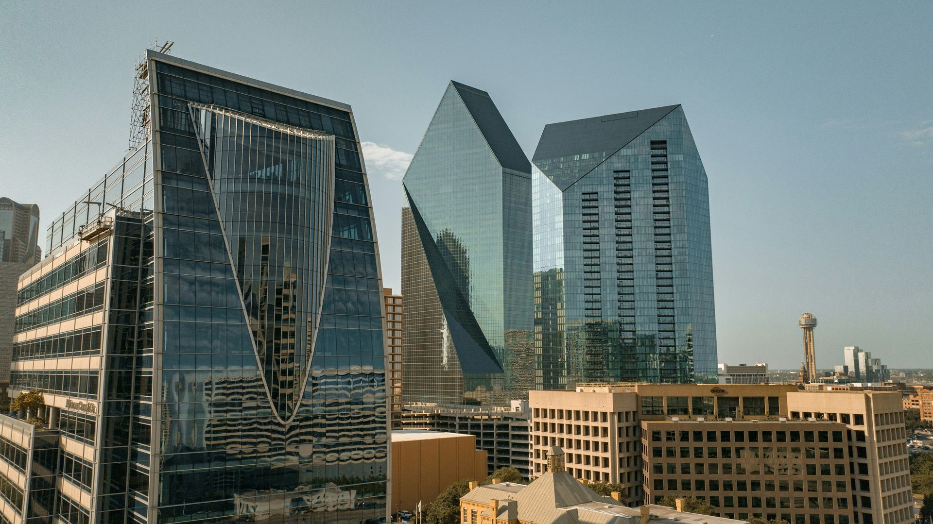 A city skyline with a lot of tall buildings