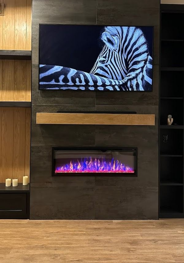 A modern media wall with a zebra on the TV, a fireplace with purple flames, and wooden shelving.