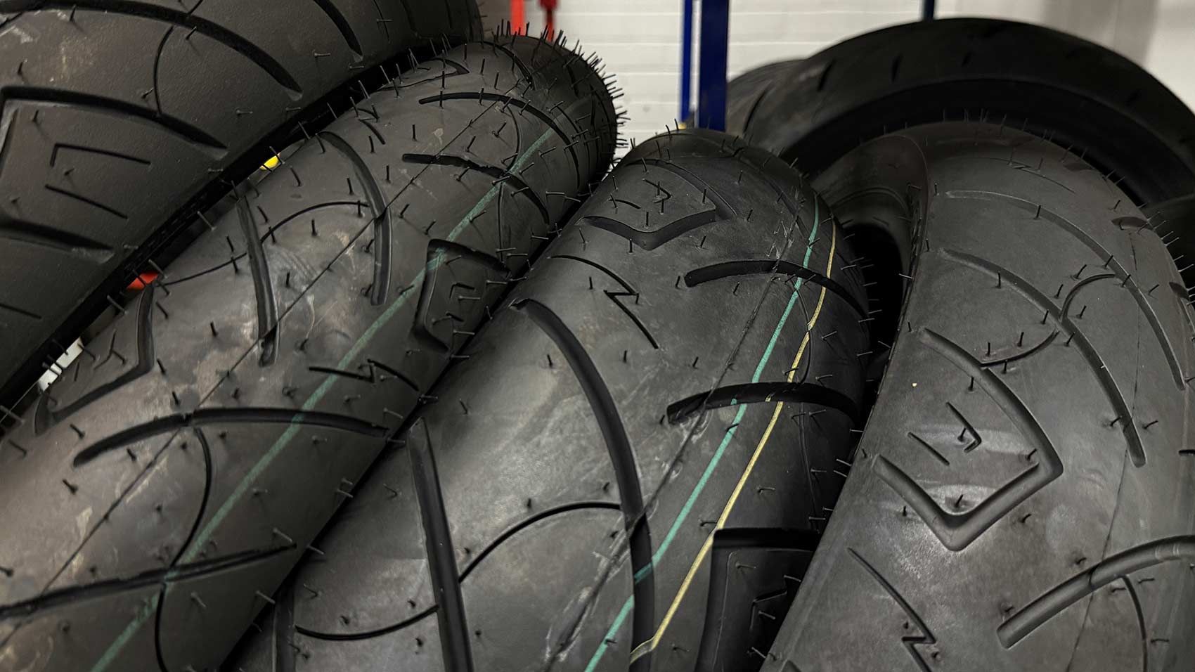 Close-up of Several Black Motorcycle Tires, Stacked Together — Newcastle Motorcycle Tyres in Broadmeadow, NSW