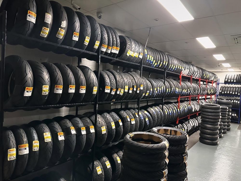 A Warehouse Filled With Lots of Motorcycle Tyres — Newcastle Motorcycle Tyres in Broadmeadow, NSW