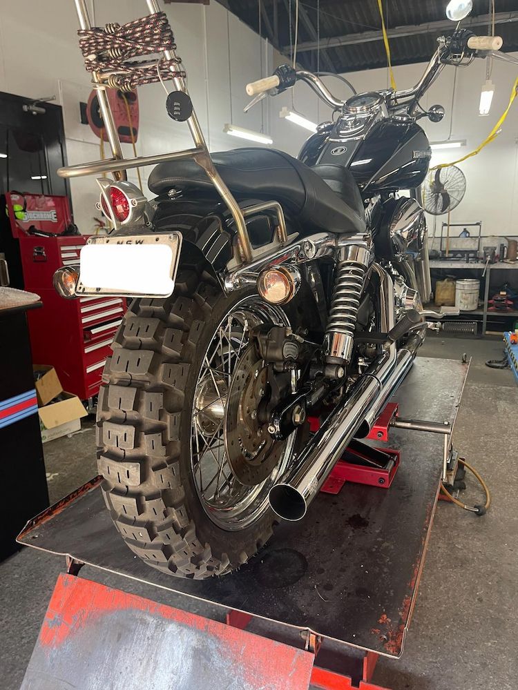 A Motorcycle is in a Garage — Newcastle Motorcycle Tyres in Broadmeadow, NSW