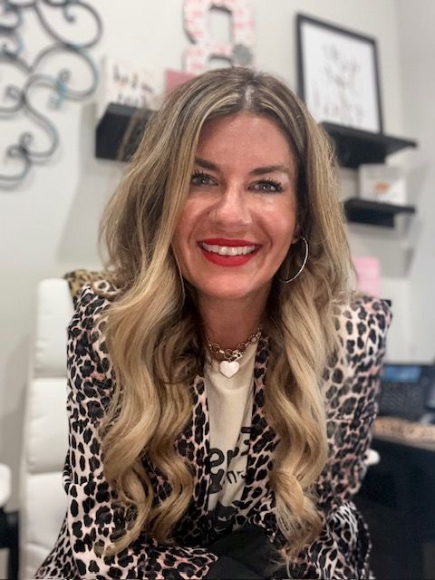 A silhouette of a man without a face in a circle.