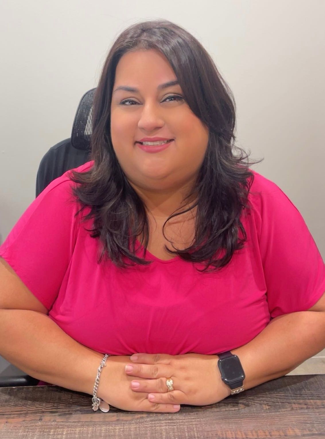 A silhouette of a man without a face in a circle.