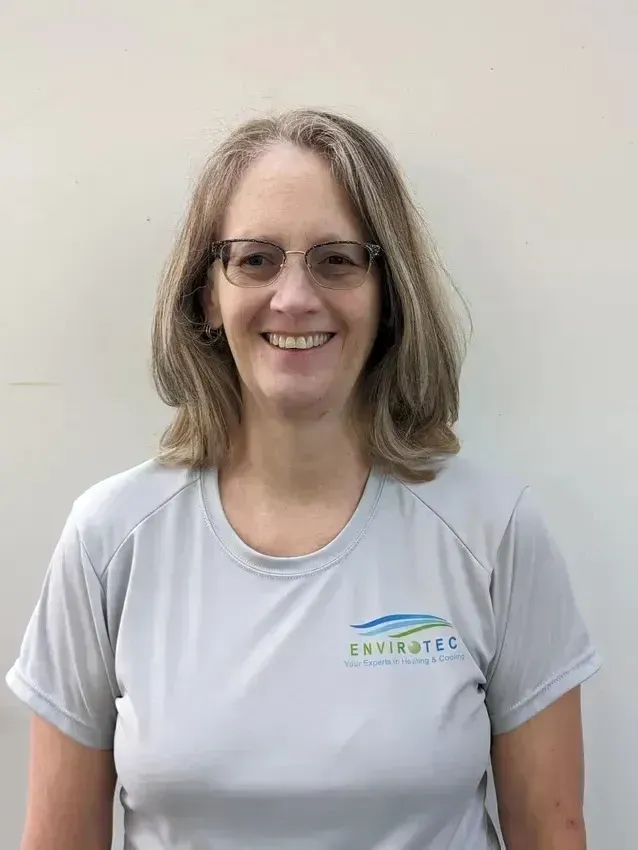 Hvac-Contractor-Bradenton-Bald man with a beard in a white polo shirt; Envirotec logo visible.