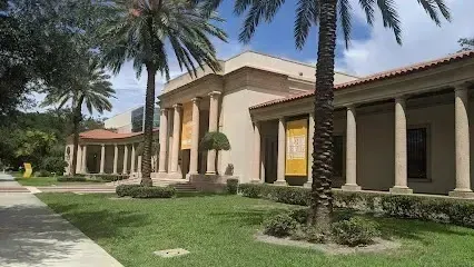 Hvac-Contractor-Bradenton-A large building with palm trees in front of it