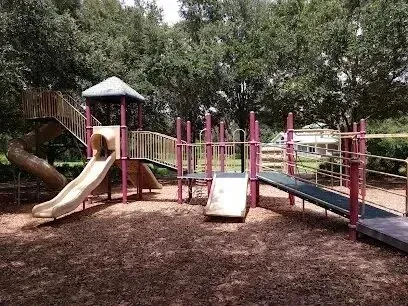 Hvac-Contractor-Bradenton-A playground with a slide and stairs in a park.