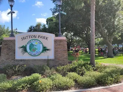 Hvac-Contractor-Bradenton-A sunset over a body of water with tall grass in the foreground