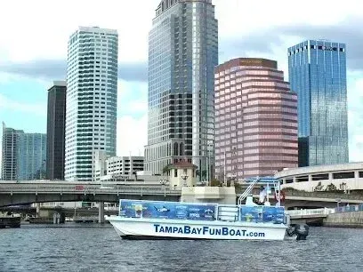 Hvac-Contractor-Bradenton-Boat on water with Tampa, Florida skyline in the background.