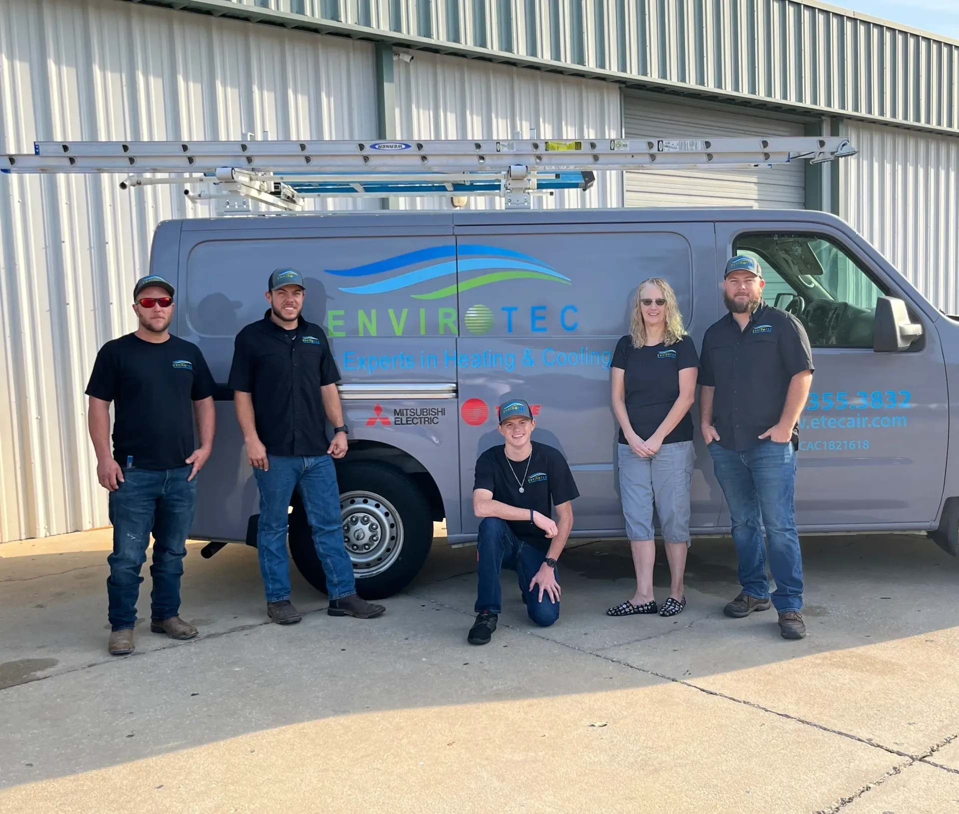 photo of the envirotec team and management in front of the company work van