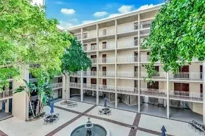 Hvac-Contractor-Bradenton-A large building with a fountain in the middle of it.